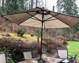 407 Outside Dining Table For Six With Umbrella And Recliner Chair