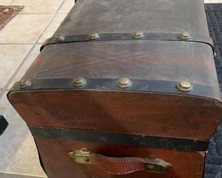 #19- Small antique Jenny Lind style trunk- leather covered- 24w x 13t x 13 1/2d- $120