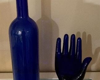 #9- Lot of 3 "Blue" items- glass mannequin hand, blue glass bottle and ceramic vase with several Golden Ox matchbooks- $50 for ALL