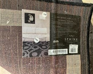 #16- Oriental Weavers Andy Warhol Pop Abstract Suns area rug- 11.2 x 7.1- $300