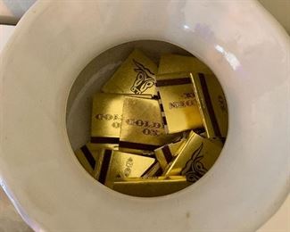 #9- Lot of 3 "Blue" items- glass mannequin hand, blue glass bottle and ceramic vase with several Golden Ox matchbooks- $50 for ALL