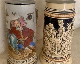 #32- 2 German steins- 10 1/2 inches tall- $40