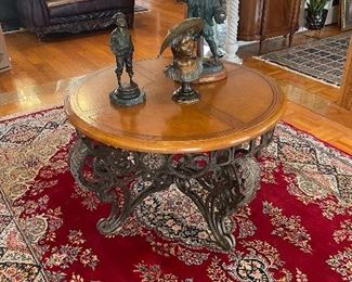 metal and wood center table, bronzes