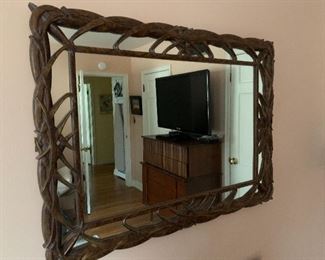 Decorative mirror with resin overlay by the Carolina Mirror company 38" x 29" wired so it can be hung vertically or horizontally 
