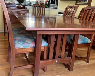 Kincaid Trestle table  cherry dining table with two armchairs and 6 side chairs, 2 16" apron leaves 42" x 68" x 30"