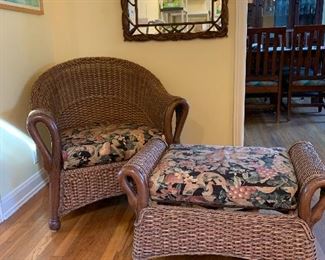 Wicker chair and ottoman with goosehead motif and upholstered cushions