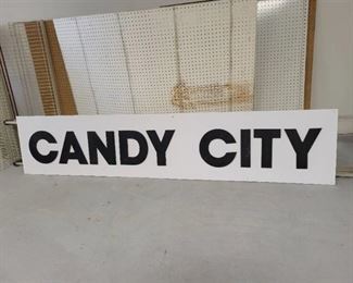 Candy City Sign Black Lettering White Background