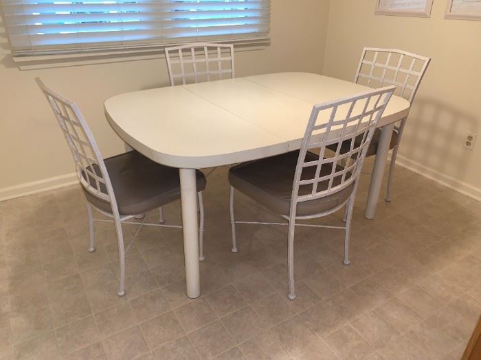 Dinette Kitchen Table without leaf 42w 42d, with leaf 59 x 42.  Set of 4 metal chairs 19.5w 18d.  Cramco Furniture, Miami FL