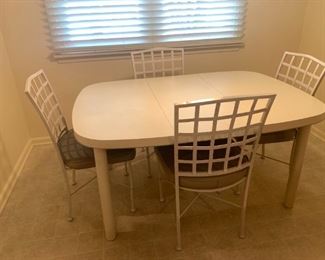 Kitchen Table with 1 leaf and 4 heavy metal chairs, seat pads.  Solid and sturdy.  59 x 42 x 29h with 1 leaf (17).  Square without leaf.    Cramco Furniture, Miami FL