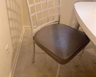 Kitchen Table with 1 leaf and 4 heavy metal chairs, seat pads.  Solid and sturdy.  59 x 42 x 29h with 1 leaf (17).  Square without leaf.    Cramco Furniture, Miami FL