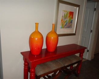 SOFA TABLE WITH STOOLS CLAY POTS AND FRAMED ART 