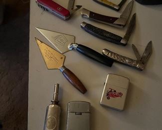 Nice knives and a few more lighters including a red Barron 