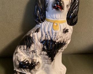 Staffordshire style pottery dog figurine