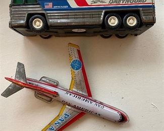 Vintage tin Pan Am Boeing 727 and Greyhound bus 