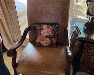 pair of leather arm chairs