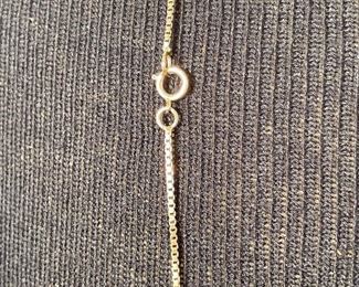 1-N90- $120 
14kt yellow gold chain 5 grams 24"L 