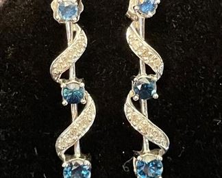 5-E7- $100 
14kt white gold earrings with lab made blue stone & diamonds
