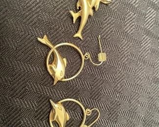 39- $75 
14kt yellow gold dolphin pendant 2.56 gr & 2 earrings 