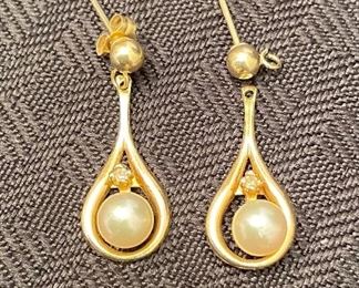 40- $75 
14kt yellow gold & pearls dangling earrings 