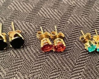 43- $75 LOT 
3 pair of earring studs  multi stones garnet, emerald, sapphires lab