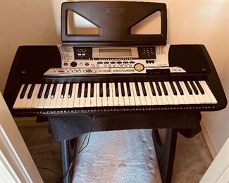 57____$550
Yamaha piano PSR550