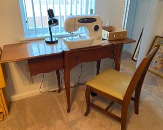 105_____ $150 
 Sewing machine Brothers/cabinet / chair 
