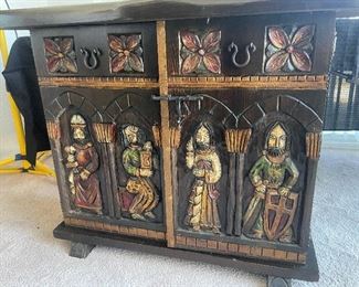 4_____ $450 
Pair of Spanish Castillian carved cabinets • 39"W x 14"D x 31"