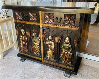 4_____ $450 
Pair of Spanish Castillian carved cabinets • 39"W x 14"D x 31"