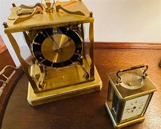 28_____ $50 
Two brass clock Schatz & other one 