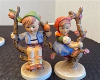 48_____ $75 
Hummels/Goebles set of 6: 4 on tree limbs, 1 boy walking,carriage baby