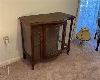 51_____ $195 
Small curio cabinet with bombe edged glass door  • 32"x 29"x17"D