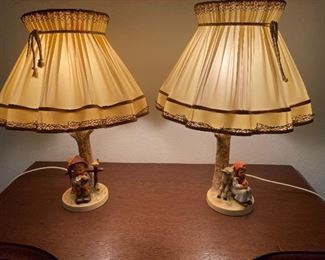 52_____ $130 
Pair of Hummels Goebels Lamps  • 17"H x 5"W 