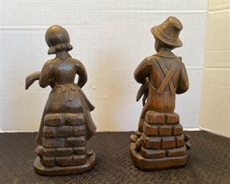 65_____ $40 
Pair of children wood carved 