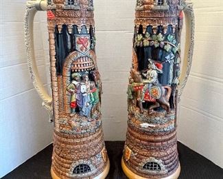 84_____ $90 
Set of two super large steins  • 25" x 8" made in Germany 