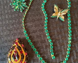 121_____ $50 
Emerald green rhinestones & Amerthyst pear shaped pin/pendant, CORO
