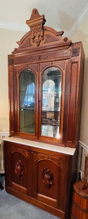 #120 - $995. 19th century Hunting cabinet walnut and carved birds on doors. • 99high 41wide 23deep