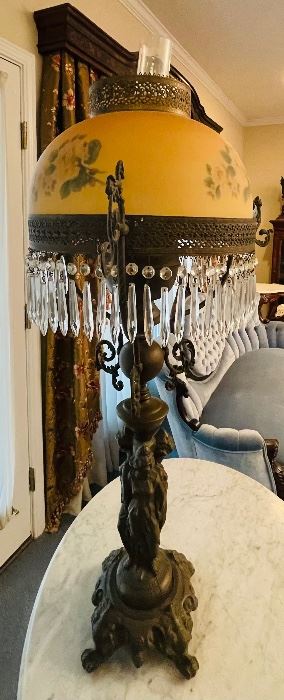 #92 - $295 Victorian figural lamp of maiden, dome shaped yellow shade with roses and crystal prisms. • 38 high