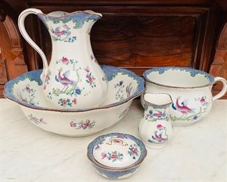 #105 - $240 Caduceus English wash set made of 5 pieces Blue & birds.
wash sad basin • 6high seven 10across
wash pitcher • 13high 10across
small basin • six high 11 across
soap dish with lid three pieces lid strainer bowl
Bud vase • 6high 4across
