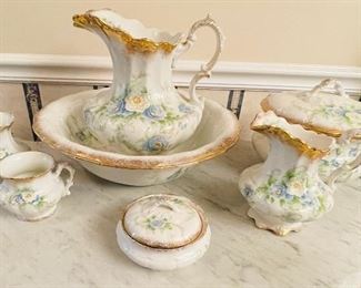 12 - $195 - English ironstone wash set (7 pieces) Blue and yellow roses gold edge. (7 pieces)
Washbasin • 6high 15across
large pitcher • 12high 10across
small pitcher • 8high 6across
chamber with lid • 6high 10across
small vase • 5high 4across
Carafe 4high • 5across
Soap dish– three pieces • 4high 6across