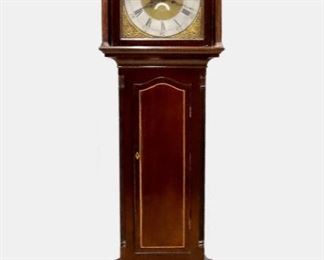 An early 19th century Scottish Grandfather clock by Thomas Logan, Maybole (Ayrshire).  8-day weight driven time and strike movement with a Brass dial, Silvered chapter ring, Roman numerals and cast Brass spandrels, subsidiary seconds dial and Date aperture.  Mahogany case with contrasting line inlay features a flat dentil molded crown over an arched dial door flanked by turned reeded columns above a narrow waist with long arched door flanked by reeded quarter columns and a simple base with short bracket feet.  Older finish with wear and some shrinkage, running when cataloged.  18 x 10 x 80" high overall.