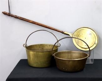 Three 19th century Brass household items.  Includes two jam pots with wrought Iron handles and a bedwarmer with etched design and turned Maple handle.  Wear to surface and patina, smaller pot dented, bedwarmer handle loose.  Up to 13 1/2" diameter and 43 1/2" long.  ESTIMATE $50-100
