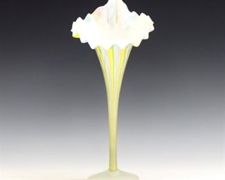 A 1970's Italian Rainbow Mother of Pearl art glass vase.  Handblown trumpet form with ruffled rim in pastel Pink, Blue and Yellow "Diamond Quilted" pattern.  Slight surface wear, two small marks in glass at stem.  12 3/4" high.  ESTIMATE $100-200
