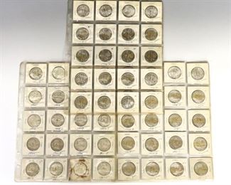 Sixty Silver U.S. Half Dollar coins.  Includes 25 Walking Libertys from 1939-1947, and 35 Franklins from 1948-1963.  Various stages of wear and toning to each, many with yellowed tag residue marks.  Each 1 1/4" diameter.  ESTIMATE $400-500
