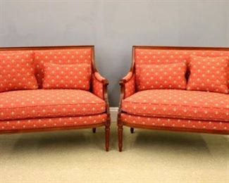 A pair of Hancock & Moore "Bristol" model settees.  Square molded backs with shaped arms and carved acanthus leaf detail on turned fluted legs. Original "Antiqued" painted Mahogany tone finish.  Very good condition.  Each 43 x 23 x 37" high.  ESTIMATE $600-800