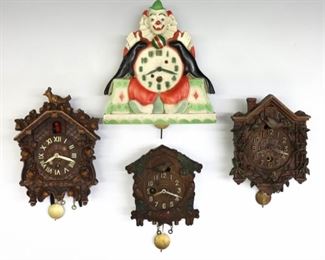 Four early 20th century novelty and cuckoo pendulette clocks by various makers.  Includes two Lux cuckoo clocks and clown, with a third cuckoo by August C. Keebler Co.  Some wear and minor damage, not tested, AS-IS.  Up to 6 1/2" high.  ESTIMATE $100-150