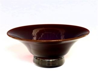 A mid 20th century Dominick Labino Art Glass bowl.  Footed flared form in variegated Oxblood glass fading from opaque to clear.  Incised "Labino" signature and dated "1968".  Minor wear.  6 1/2" diameter x 2 1/2" high overall.  ESTIMATE $200-400