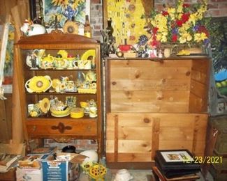 Pretty sunflower dishes, Fitz & Floyd collectibles, the wooden cabinet is from Trion Mills...was used as a blanket chest