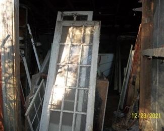 more doors in this building along with an advertising sign/board and welder