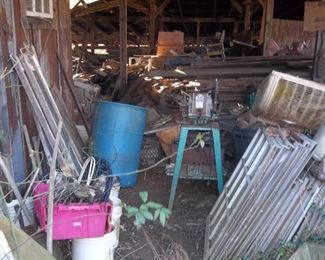 more wooden windows and LOTS of wood/boards.  Pine, Oak, Cedar, and really unsure of what all is there