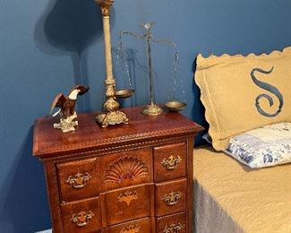One of two bedside tables